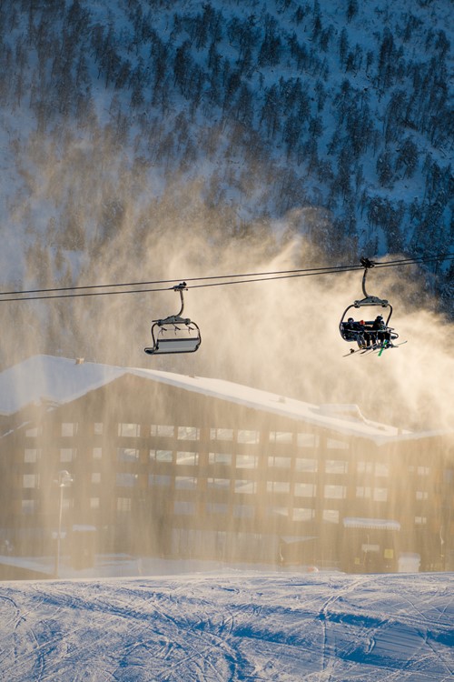 snow cannons and chairlift over Myrkdalen, ski holiday in Norway