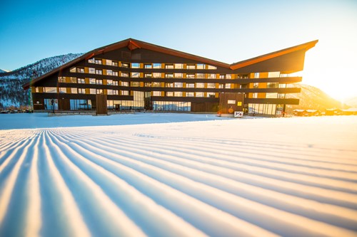 Fresh pistes as the sunrises over the Myrkdalen hotel, ski Norway