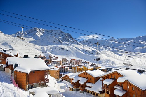 chairlift over-Val-Thorens-France-snow capped village