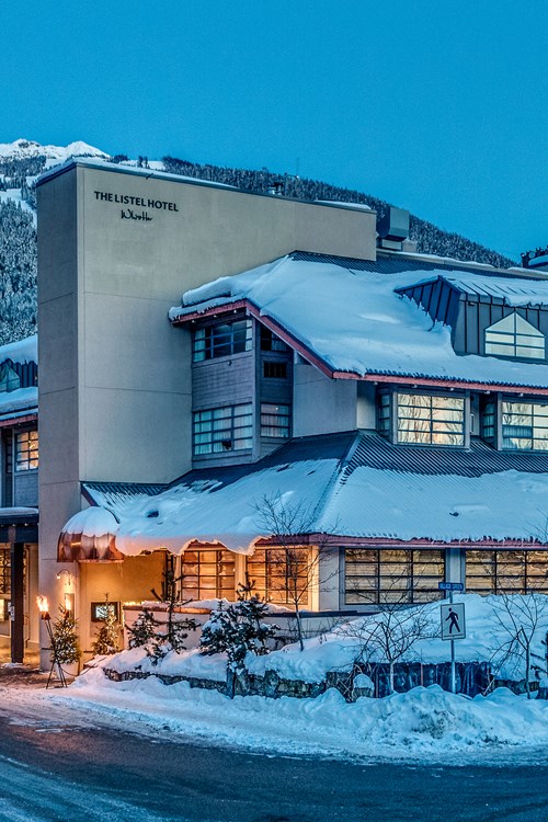 The Listel Hotel, snowy exterior, ski accommodation in Canada