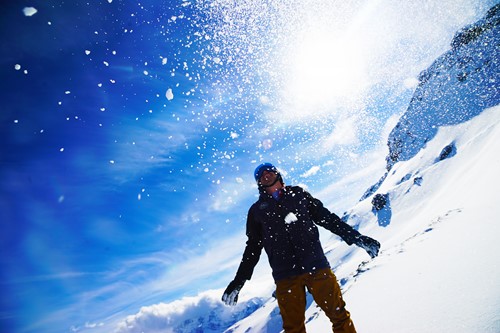 Morzine, throwing snow into blue sky.jpg