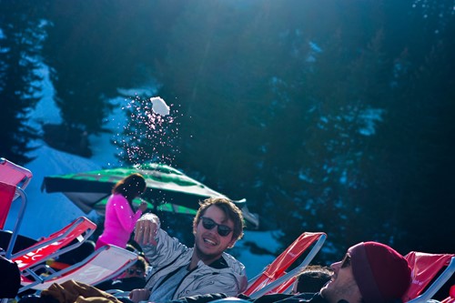 Deckchair and snowballs whilst skiing over New Year