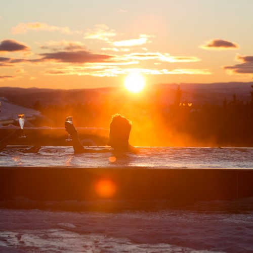Norefjell ski & spa hotel-Norefjell, outdoor hot tub in the sunset