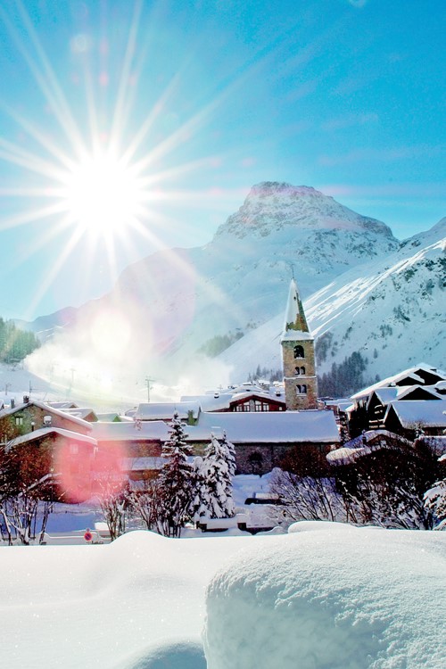 Val d'Isere-France-snow covered village and blue sky