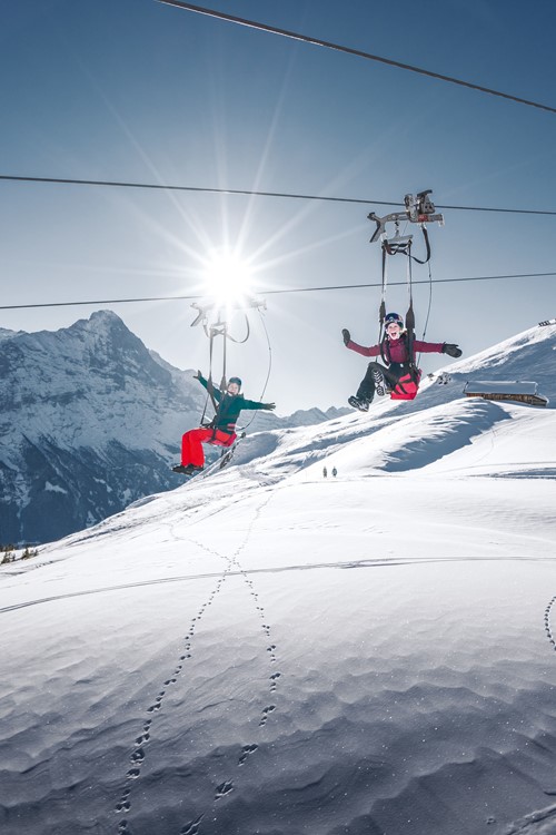 zip-lining over snow in Switzerland-skiing