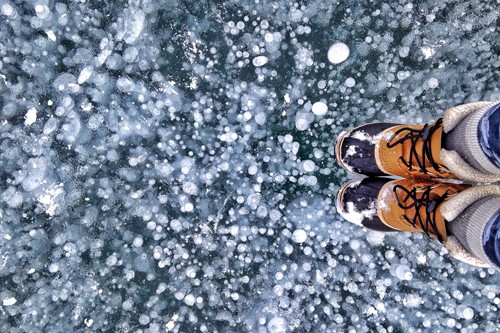 standing-on-frozen-lake-Banff-Lake-Louise.jpg