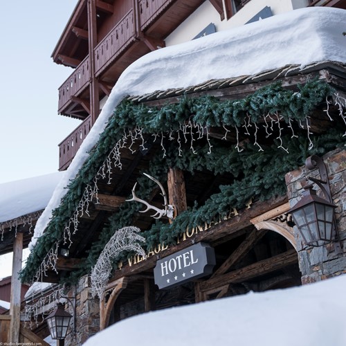 Hotel Village Montana in Tignes hotel sign in snow