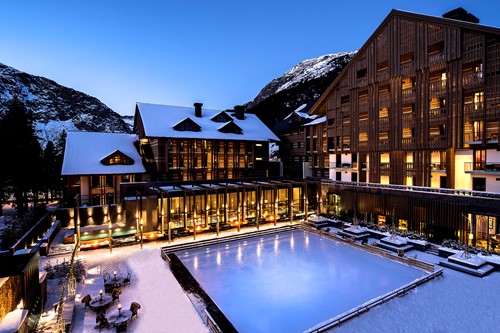 the chedi andermatt night time pool view