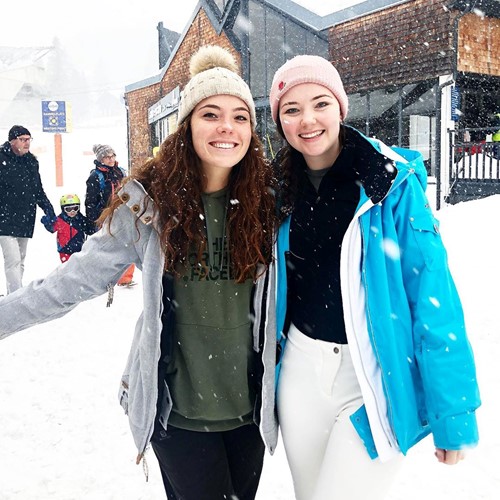 two girls celebrate the snow in st anton