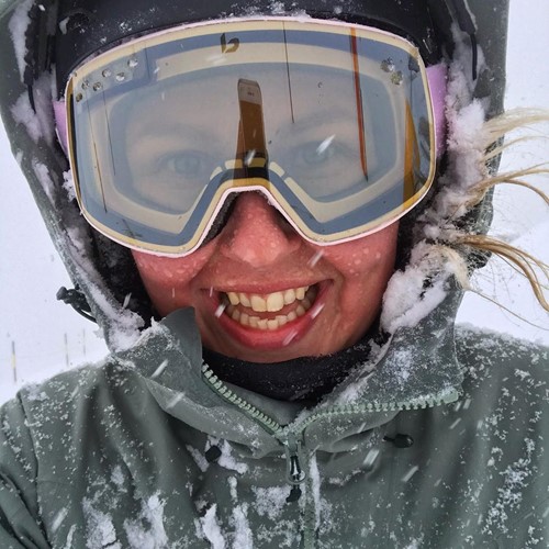 skier takes selfie in snow