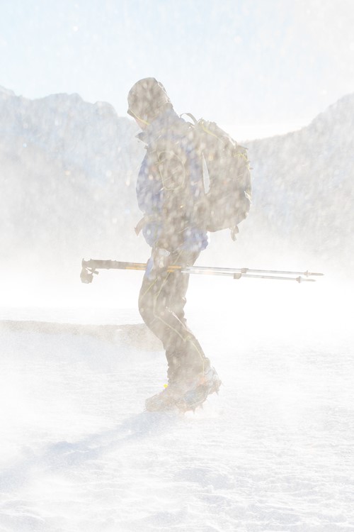 man in snow on mountain top