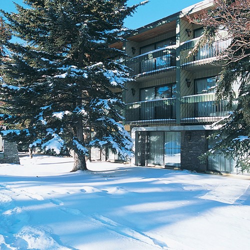 Banff Aspen Lodge, ski accommodation in Banff, Canada - snowy hotel exterio
