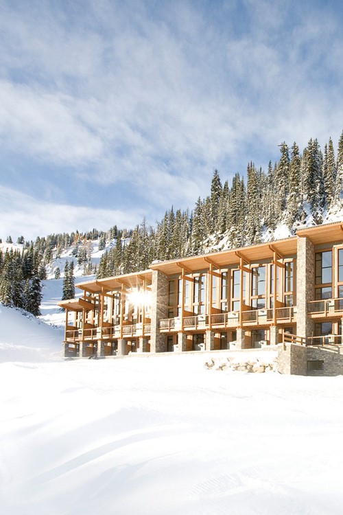 Sunshine Mountain Lodge - snowy exterior of ski accommodation in Canada