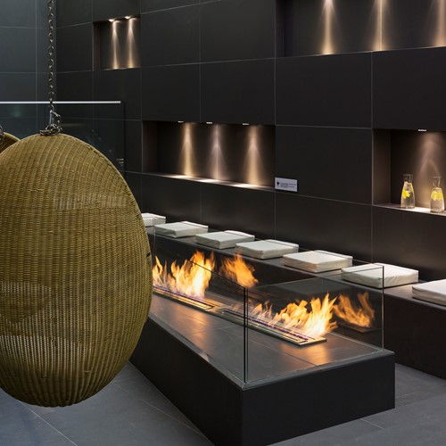 Hotel Heliopic-Chamonix-France-egg chairs around the fire pit by the pool