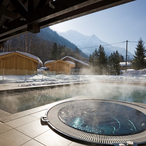 hot tub and pool in the snow Refuge des Aiglons in Chamonix