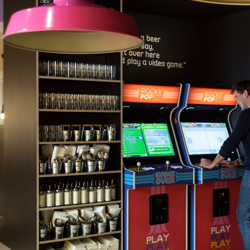 Arcade games and cabinets at the Rocky Pop Hotel. Fun and skiing.