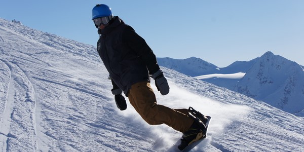 Boarding Fresh Powder in Sun Peaks