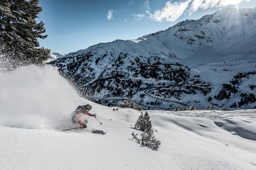 les arcs skier in powder ski break in january