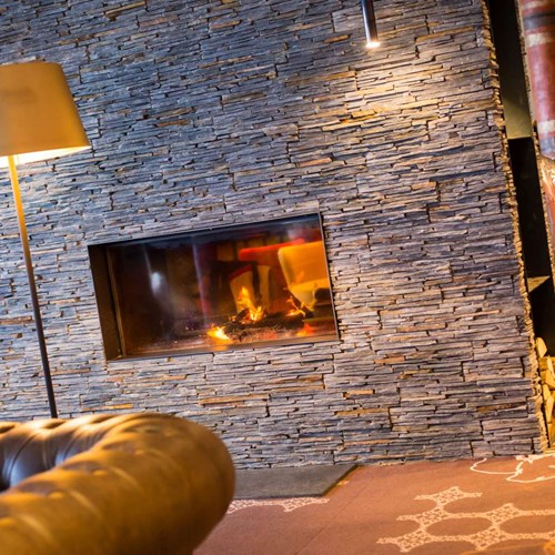 ski in, ski out hotel Taj-i Mah, Les Arcs, France - open fireplace