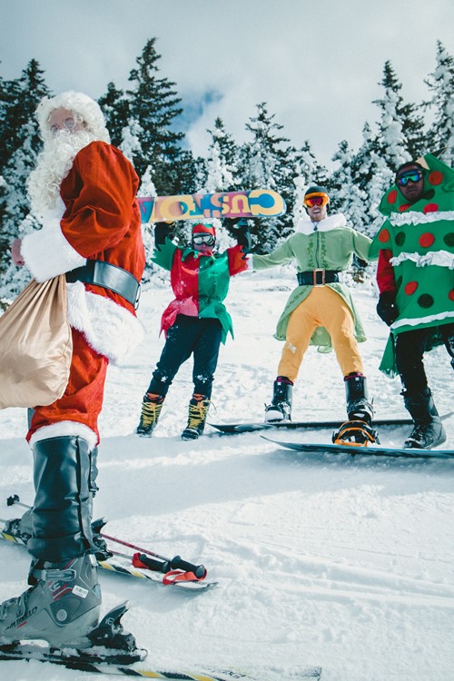 Skiing at Christmas, Santa and elves are skiing/snowboarding. Ski Christmas