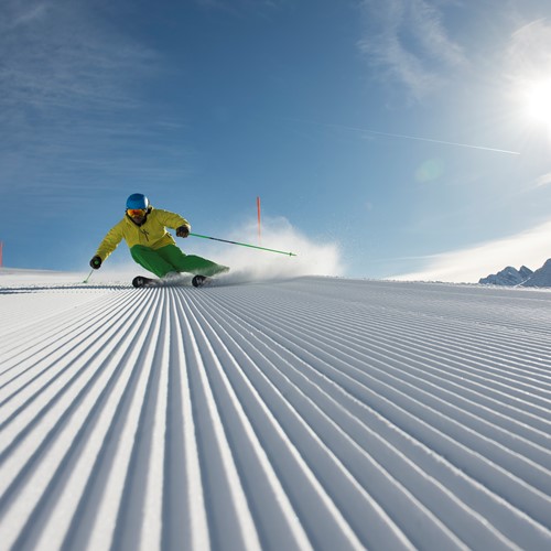 st anton fresh tracks piste basher skier