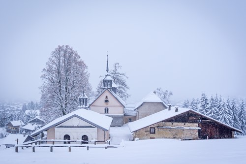 snowy church megeve