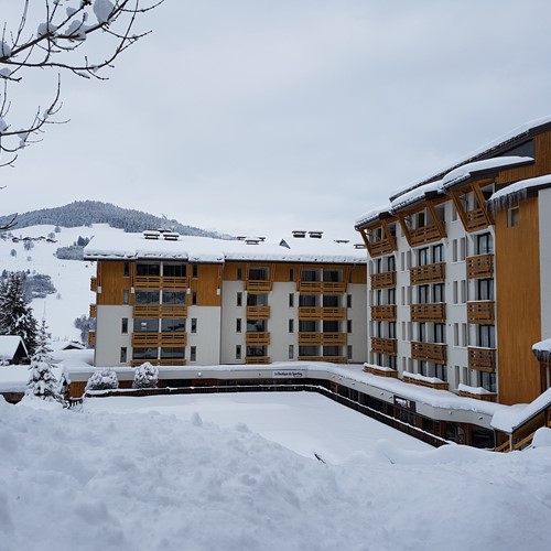 snowy exterior of hotel Royal Rochebrune Megeve, France