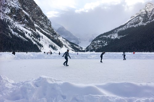 ice skating on lake louise, alberta