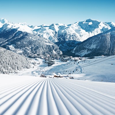 Courchevel ski weekends fresh piste basher tracks mountain valley snow