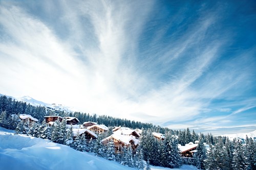 Courchevel ski weekends snowy chalets in the trees